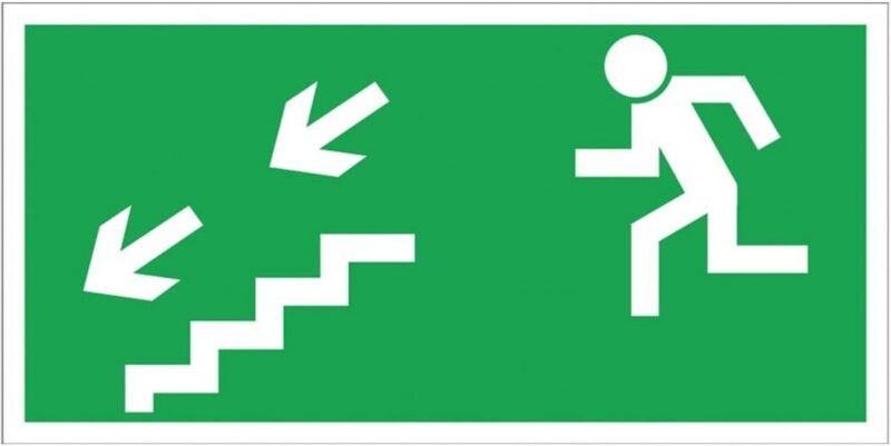 Znak Ewakuacyjny „Kierunek do wyjścia drogi ewakuacji schodami w dół w lewo"